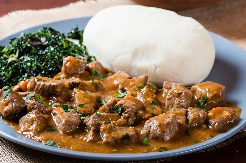 Meat, wet fried with greens and ugali